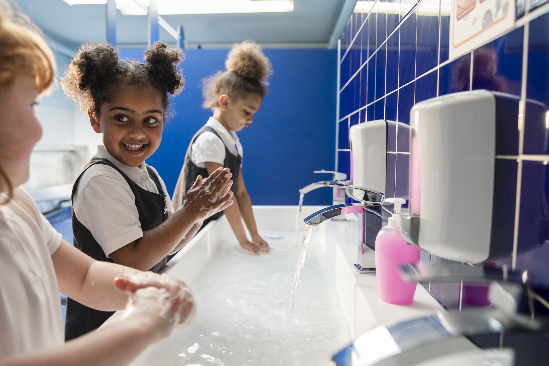 Children practicing hand hygiene